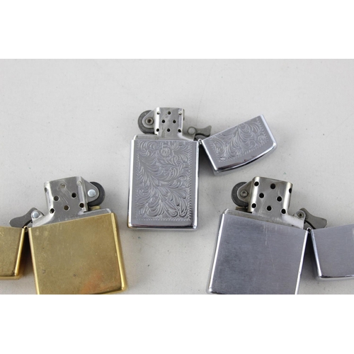 1375 - Three assorted Zippo cigarette lighters