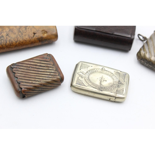 1377 - Five antique smoking accessories to include vestas, snuff boxes etc.