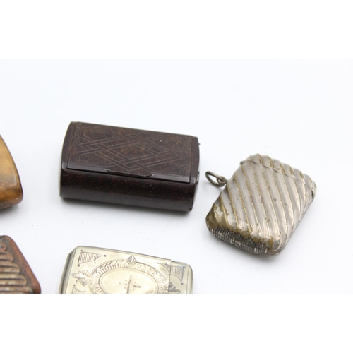 1377 - Five antique smoking accessories to include vestas, snuff boxes etc.