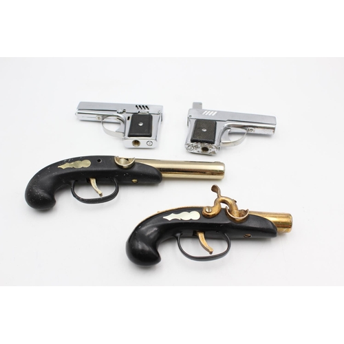 1378 - Four assorted vintage novelty gun shaped cigarette lighters