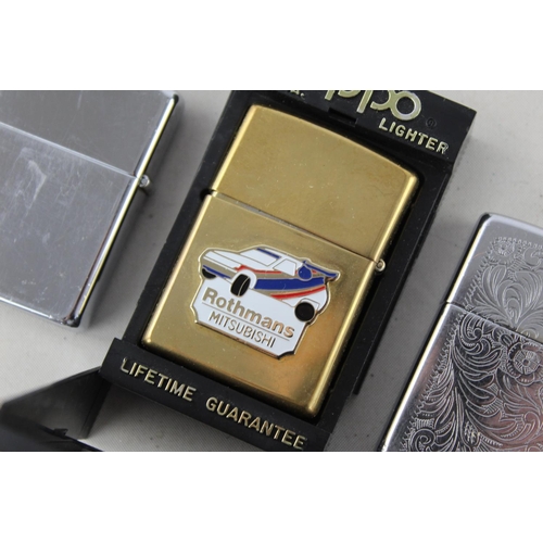 1380 - Three assorted Zippo cigarette lighters