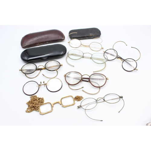 1386 - Eight pairs of antique spectacles