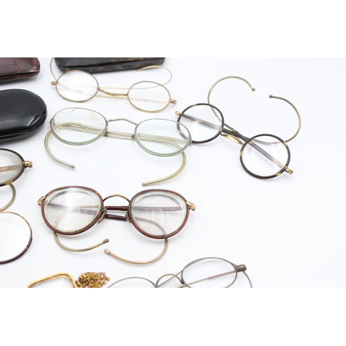 1386 - Eight pairs of antique spectacles