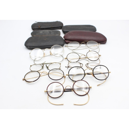 1387 - Eighteen pairs of antique spectacles