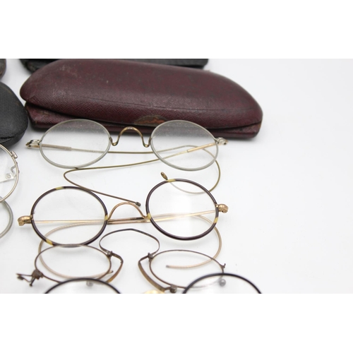 1387 - Eighteen pairs of antique spectacles