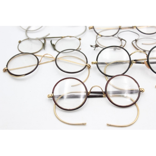 1387 - Eighteen pairs of antique spectacles