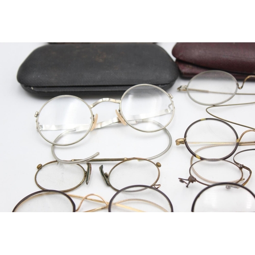 1387 - Eighteen pairs of antique spectacles