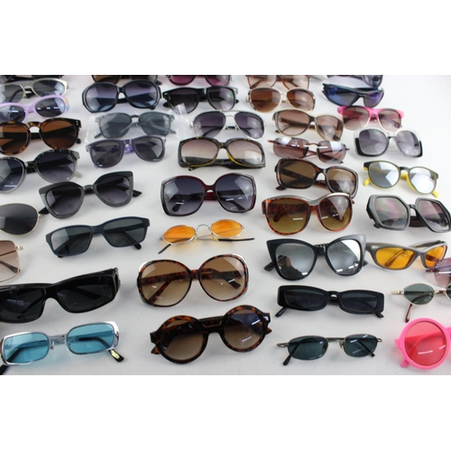 173 - A large collection of assorted sunglasses to include Miss Sixty, Thomas James, Slazenger etc.