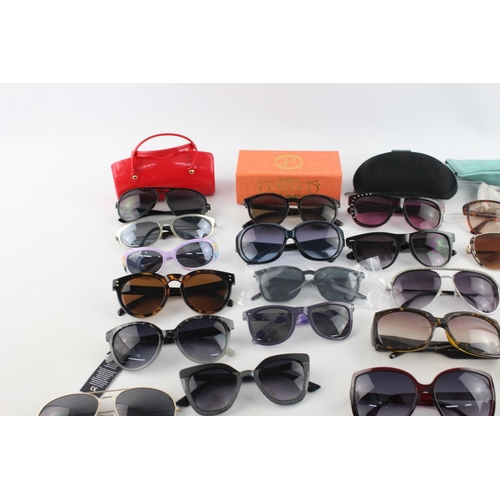 173 - A large collection of assorted sunglasses to include Miss Sixty, Thomas James, Slazenger etc.