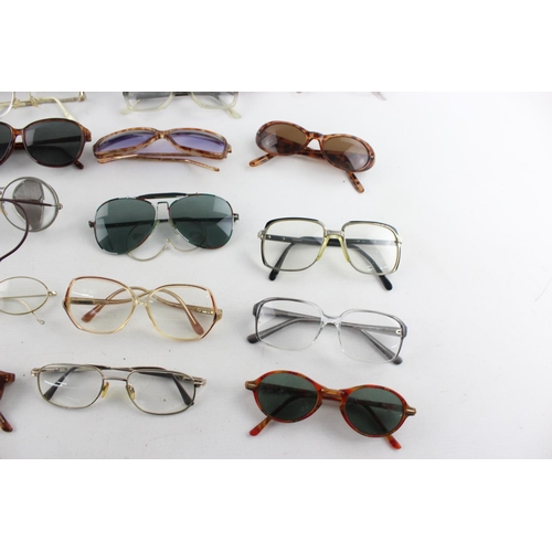 174 - A collection of assorted vintage sunglasses and spectacles