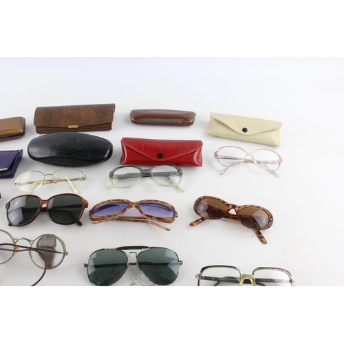 174 - A collection of assorted vintage sunglasses and spectacles