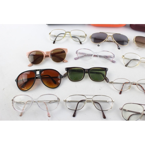 175 - A collection of assorted vintage sunglasses and spectacles