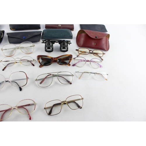 176 - A collection of assorted vintage sunglasses and spectacles