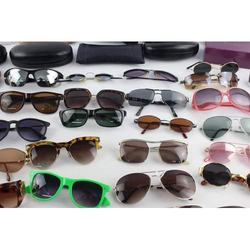 177 - A large collection of assorted sunglasses to include Ted Baker, Pilgrim, Lee Cooper etc.