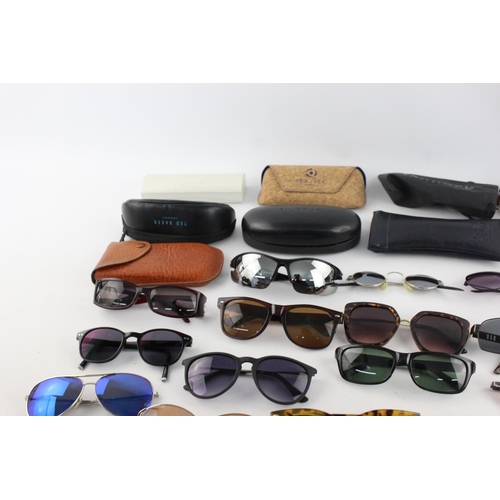 177 - A large collection of assorted sunglasses to include Ted Baker, Pilgrim, Lee Cooper etc.