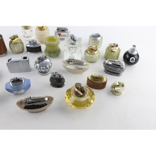 272 - A collection of assorted vintage table lighters to include Ronson, Colibri, Wedgwood etc.