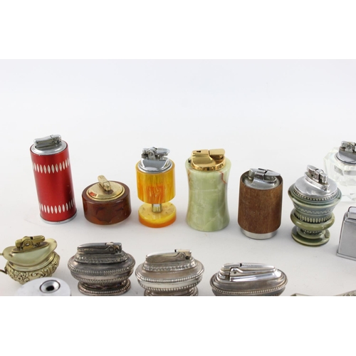 273 - A collection of assorted vintage table lighters to include Ronson, Colibri etc.