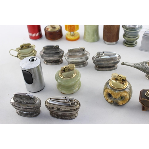 273 - A collection of assorted vintage table lighters to include Ronson, Colibri etc.