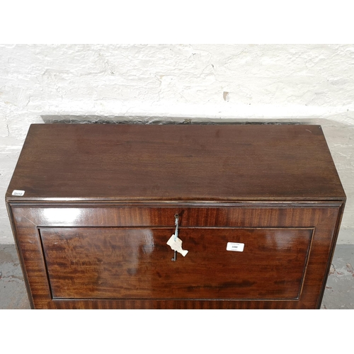 382 - A Georgian style mahogany bureau with three drawers, fall front and ball and claw supports - approx.... 