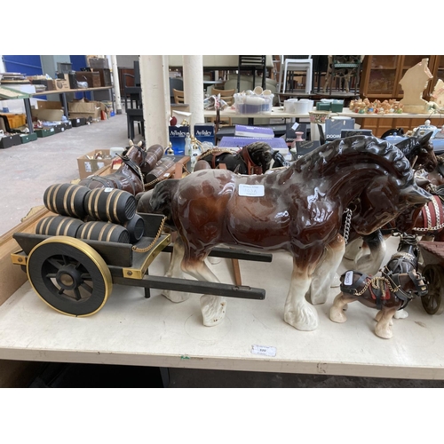 103A - A large collection of ceramic shire horse figurines