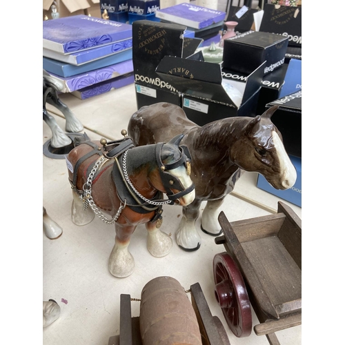 103A - A large collection of ceramic shire horse figurines