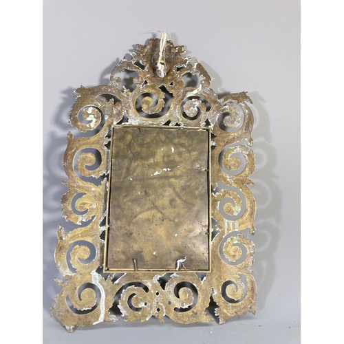 136 - An early/mid 20th century ornate brass framed bevelled edge wall mirror - approx. 40cm high x 27cm w... 