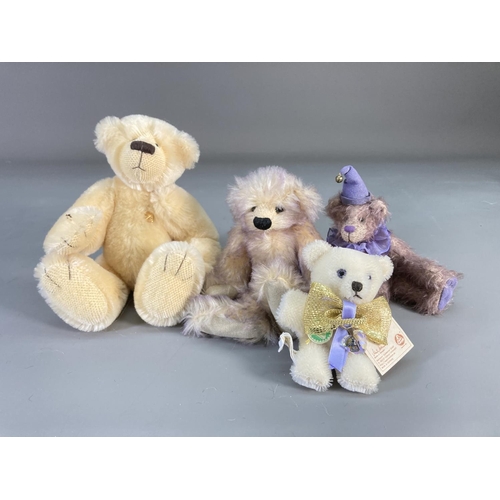 154 - A collection of assorted soft toys and teddy bears to include Charlie Bears 