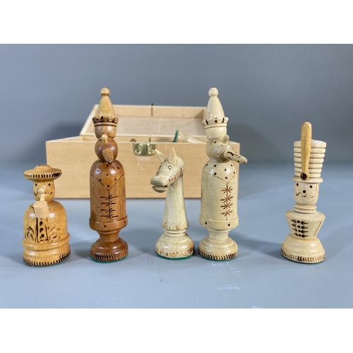 156 - A mid/late 20th century carved wooden chess set with box