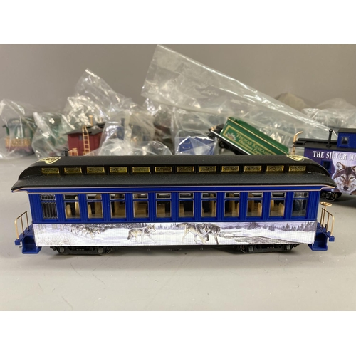 158 - A collection of Bachmann plastic model railway accessories to include The Silver Moon Express locomo... 