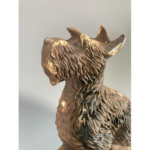 104A - A cast iron Scottie dog doorstop - approx. 32cm high x 31cm wide