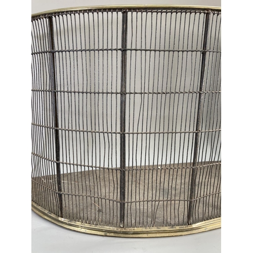 109 - An early 20th century brass and wired bow fronted fire guard - approx. 47cm high x 89cm wide