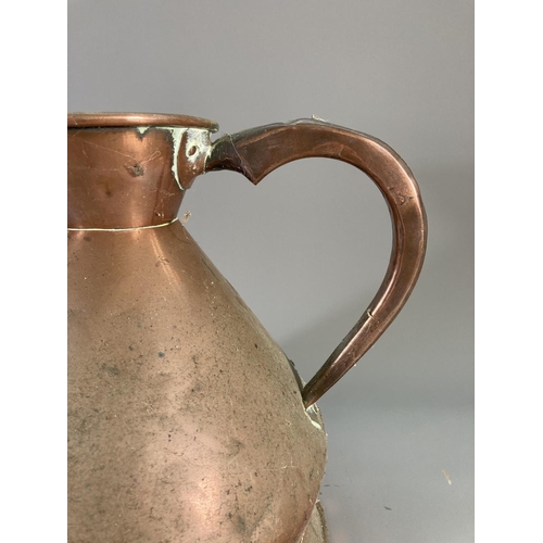 120 - A Victorian copper jug - approx. 28cm high