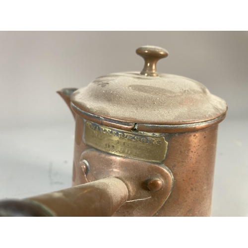 123 - Four Victorian copper measuring jugs, three monogrammed GHN with oak handles and one I. Warner & Son... 