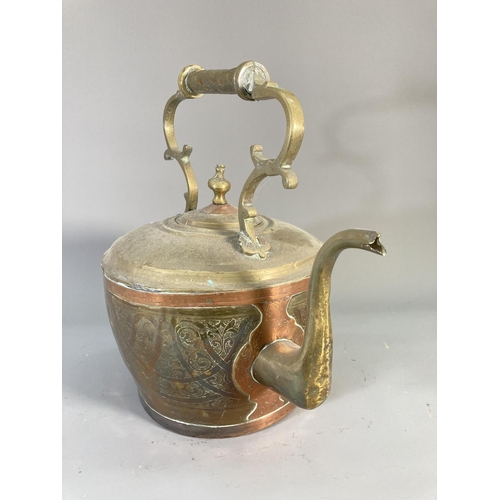 125 - Two pieces of antique metalware, one copper and brass kettle - approx. 34cm high and one Lucas no.38... 