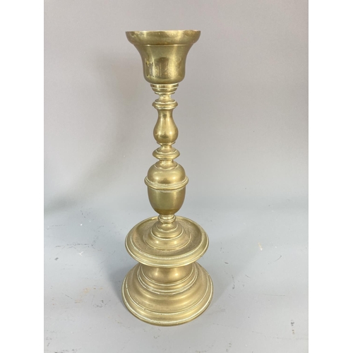 126 - A pair of 19th century brass candlesticks - approx. 28cm high