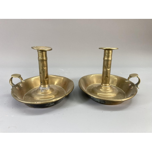 128 - Four 19th century brass chamber sticks