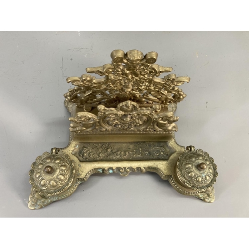 130 - A mid 20th century brass ink stand with cherub design - approx. 20cm high x 30cm wide x 20cm deep