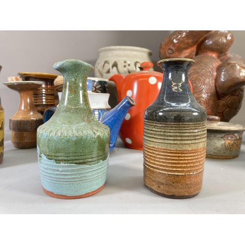 67 - A collection of mid/late 20th century studio pottery to include Portmeirion Magic City utensil holde... 