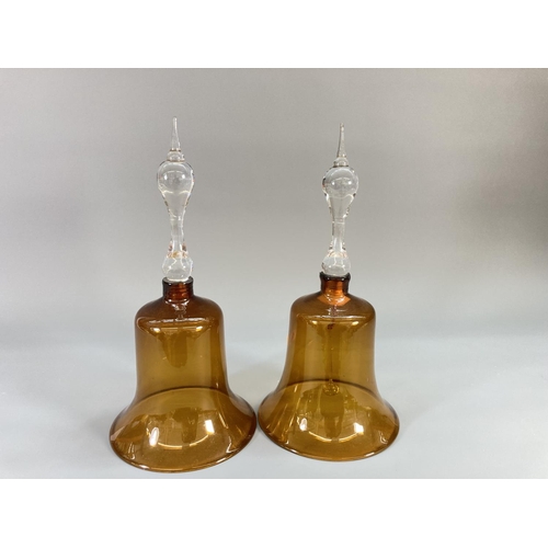 71 - Four late 19th century coloured glass bells - largest approx. 30cm high