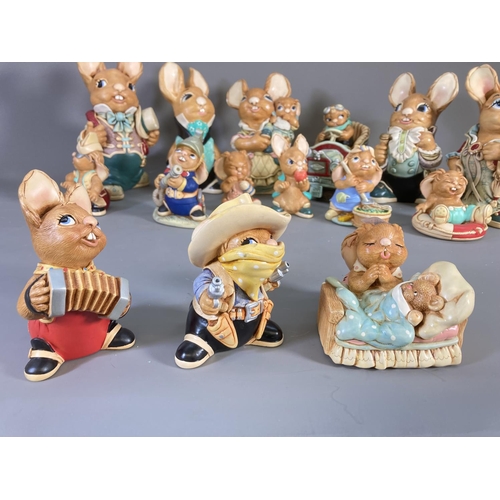 83 - A collection of Pendelfin hand painted stonecraft rabbit figurines to include Aunt Ruby, Uncle Henry... 