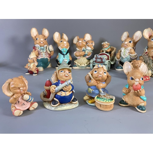 83 - A collection of Pendelfin hand painted stonecraft rabbit figurines to include Aunt Ruby, Uncle Henry... 