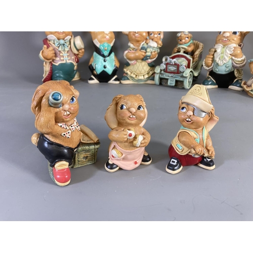 83 - A collection of Pendelfin hand painted stonecraft rabbit figurines to include Aunt Ruby, Uncle Henry... 