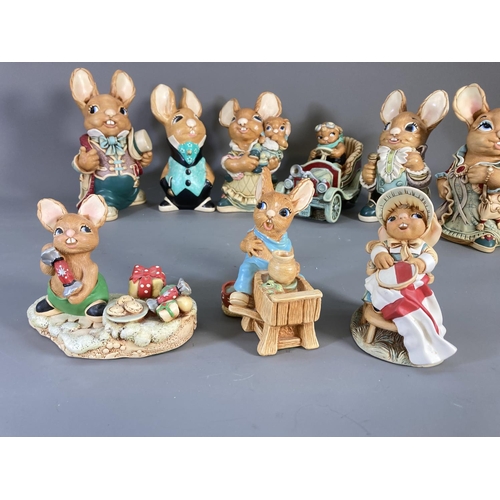 83 - A collection of Pendelfin hand painted stonecraft rabbit figurines to include Aunt Ruby, Uncle Henry... 