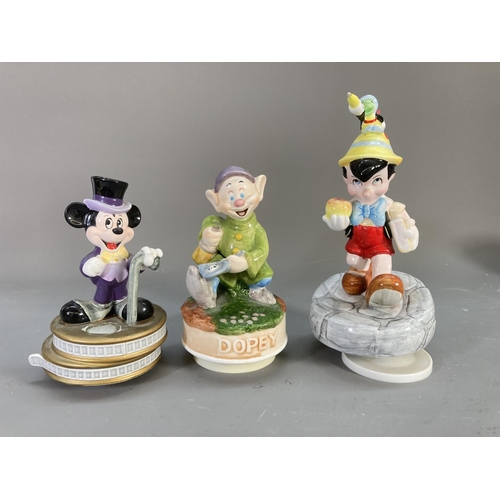 84 - A collection of Disney ceramics and collectables to include Winnie the Pooh jug and bowl, Clover Sno... 