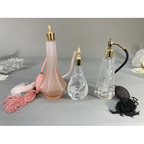 91 - A collection of studio glass atomisers and scent bottles to include Royal Welsh Crystal, Venetian gl... 