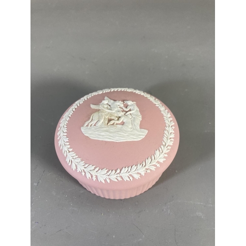 94 - Four pieces of boxed Wedgwood Jasperware, two pink circular trinket boxes, one sage green circular t... 