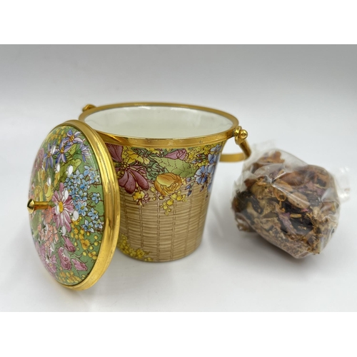 9 - A boxed Halcyon Days enamel potpourri basket - approx. 7.5cm high excluding handle x 6.5cm diameter