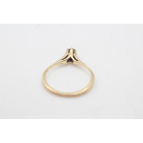 2068 - A 14ct gold diamond solitaire prong setting ring, size M - approx. gross weight 1.5 grams