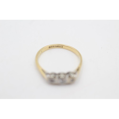 2072 - An 18ct gold and platinum diamond three stone cathedral setting ring, size O - approx. gross weight ... 