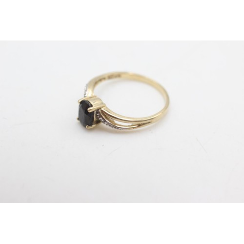 2074 - A 9ct gold sapphire and diamond ring, size P - approx. gross weight 1.9 grams